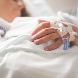 Woman in the hospital receives IV medication