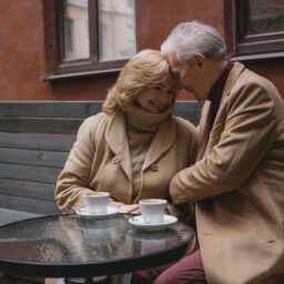 Older couple enjoying a coffee date.
