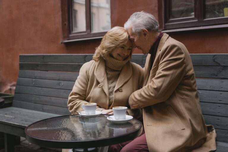 Older couple enjoying a coffee date.